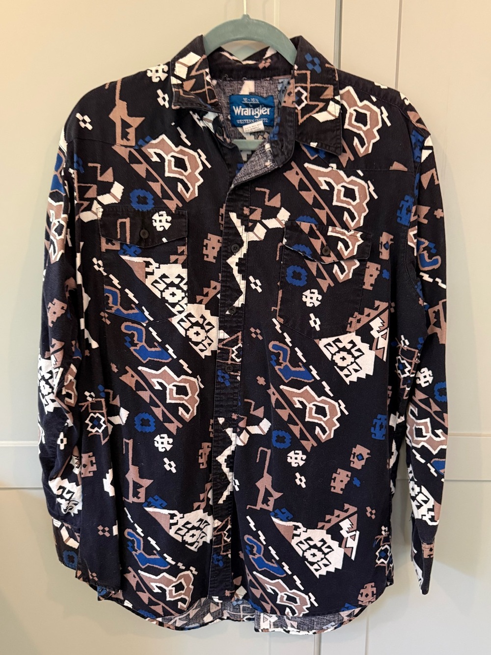 Wrangler Men’s Black Geometric Zip-Up Sweater with Blue and Tan Accents